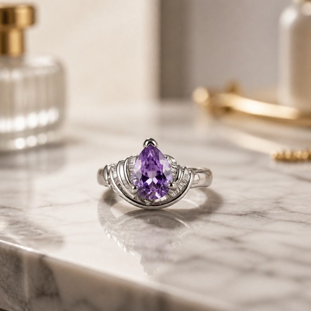 The Lilac Blossom Ring ā Pear Cut Amethyst Stone in Silver Ribbon